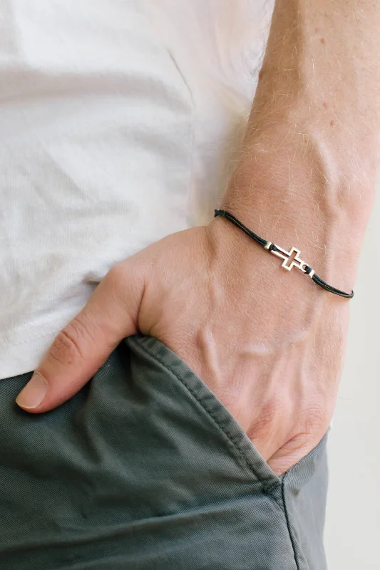 Men's bracelet with silver outline cross pendant, black cord, Christian gift for him