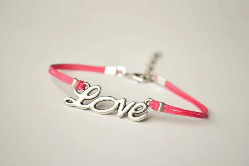 Pink cord bracelet with a silver love charm, anniversary gift for her