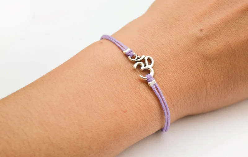 Purple bracelet with silver Om charm, yoga jewelry