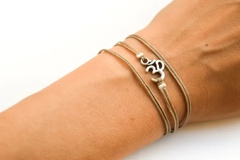 Yoga bracelet, wrapped brown string with silver Om charm, Mantra Sanskrit bracelet, handmade jewelry