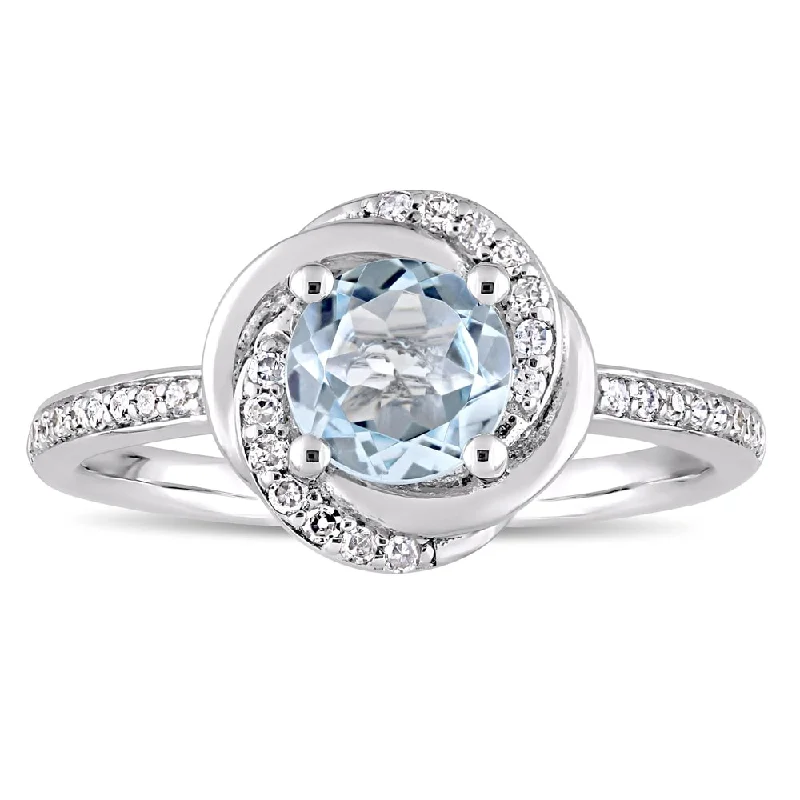 Miadora 10k White Gold Sky-Blue Topaz and 1/6ct TDW Diamond Swirl Halo Ring